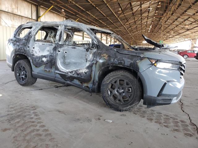 Photo 4 from auction – 2023 HONDA PILOT TRAI with VIN 5FNYG1H68PB048581