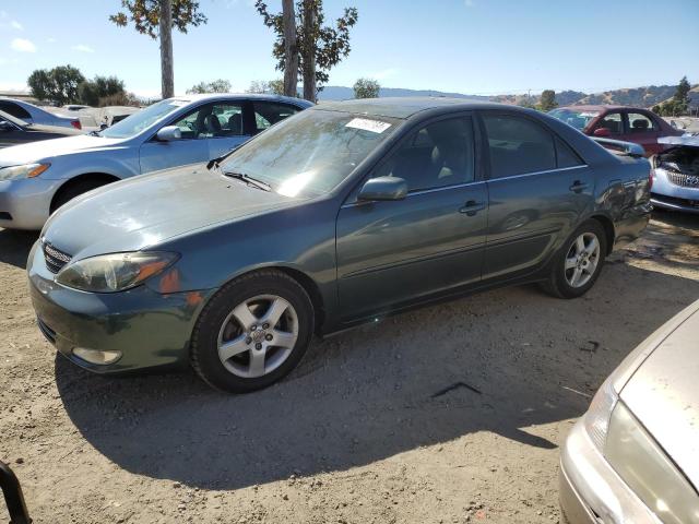 TOYOTA CAMRY LE 2002 with VIN 4T1BF30K32U511140 - Photo from auction