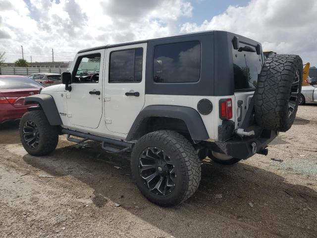 Photo 2 from auction – 2015 JEEP WRANGLER U with VIN 1C4BJWEG9FL732732