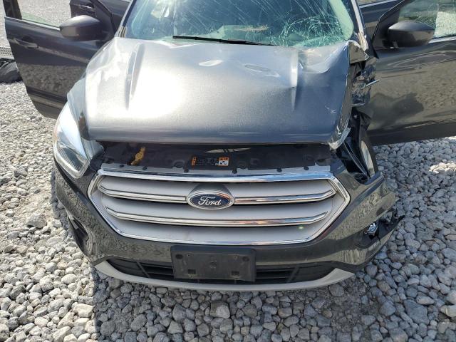 Photo 12 from auction – 2018 FORD ESCAPE with VIN 1FMCU9HD6JUA52722