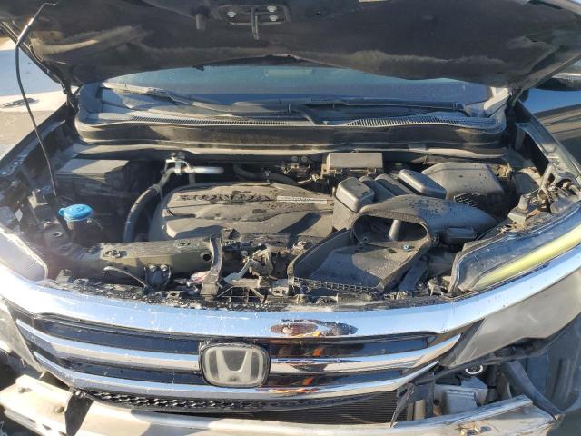 Photo 12 from auction – 2016 HONDA PILOT ELIT with VIN 5FNYF6H05GB028087