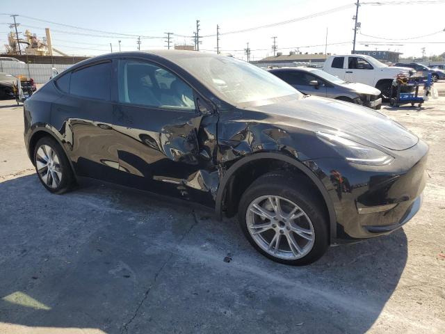 Photo 4 from auction – 2023 TESLA MODEL Y with VIN 7SAYGDED1PF979477