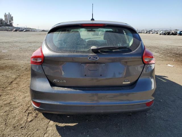 Foto 6 de la subasta – 2015 FORD FOCUS SE con VIN 1FADP3KE0FL348739