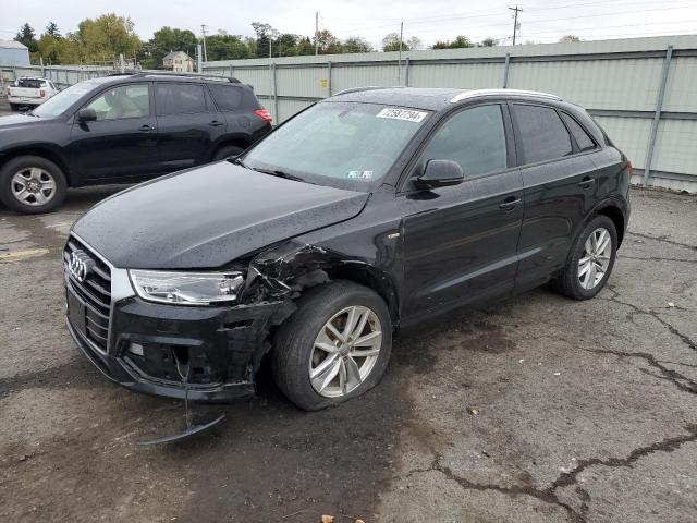 AUDI Q3 PREMIUM 2018 with VIN WA1BCCFS7JR018934 - Photo from auction