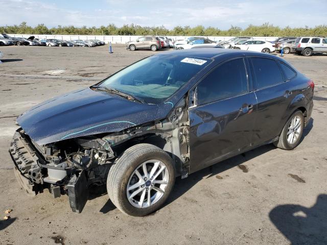 FORD FOCUS SE 2018 with VIN 1FADP3FE8JL313563 - Photo from auction