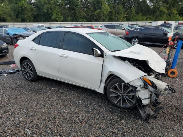 Photo 4 from auction – 2017 TOYOTA COROLLA L with VIN 5YFBURHE1HP694393