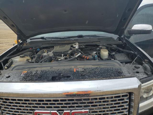 Photo 11 from auction – 2015 GMC SIERRA K25 with VIN 1GT120E8XFF117541