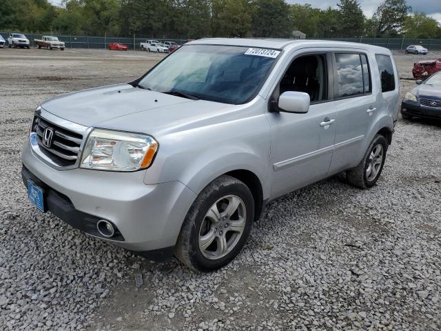 HONDA PILOT EXL 2012 with VIN 5FNYF4H52CB023780 - Photo from auction