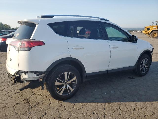 Photo 3 from auction – 2016 TOYOTA RAV4 XLE with VIN JTMRFREV0GJ080354