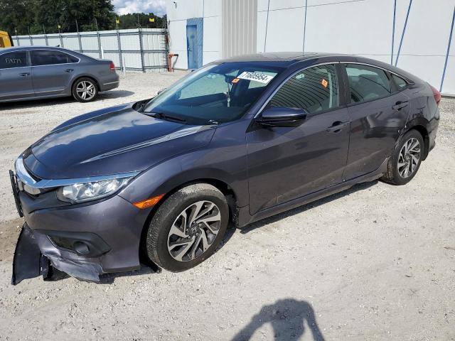 HONDA CIVIC EX 2016 with VIN 19XFC2F8XGE059682 - Photo from auction