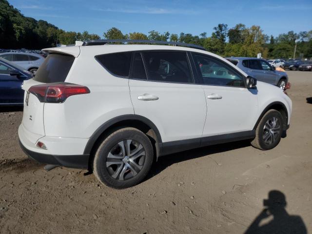 Photo 3 from auction – 2018 TOYOTA RAV4 LE with VIN 2T3BFREV0JW848425