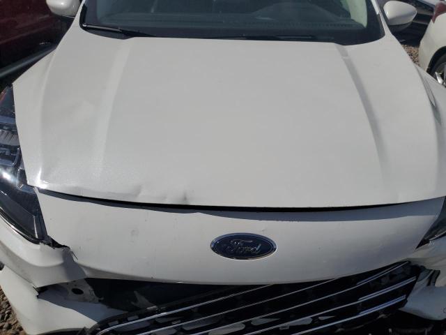 Photo 11 from auction – 2021 FORD ESCAPE TIT with VIN 1FMCU9J95MUB31308