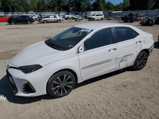 TOYOTA COROLLA L 2017 with VIN 2T1BURHE8HC940193 - Photo from auction