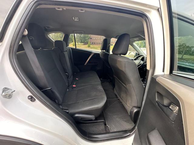 Photo 6 from auction – 2018 TOYOTA RAV4 LE with VIN 2T3BFREV8JW776938