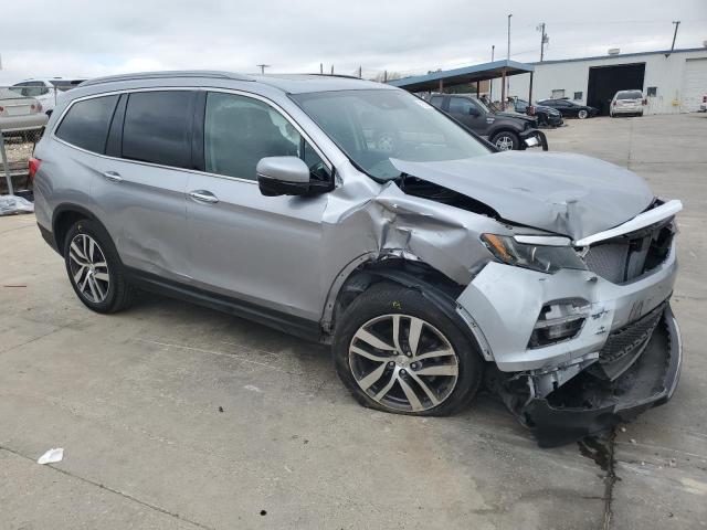 Photo 4 from auction – 2017 HONDA PILOT TOUR with VIN 5FNYF5H95HB020646