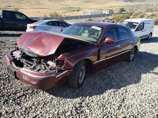 LINCOLN TOWN CAR E 2001 with VIN 1LNHM81W11Y659065 - Photo from auction