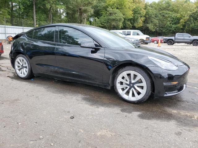 Photo 4 from auction – 2022 TESLA MODEL 3 with VIN 5YJ3E1EB7NF179919
