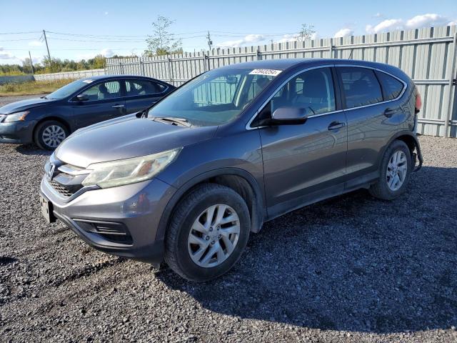 HONDA CR-V SE 2015 with VIN 2HKRM4H41FH102719 - Photo from auction