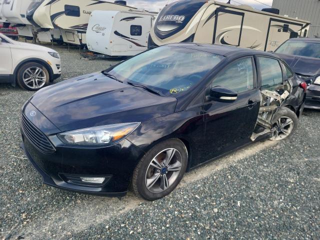 FORD FOCUS SE 2016 with VIN 1FADP3FE0GL239807 - Photo from auction