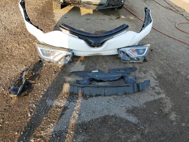 Photo 13 from auction – 2018 TOYOTA RAV4 LE with VIN 2T3BFREV2JW719537