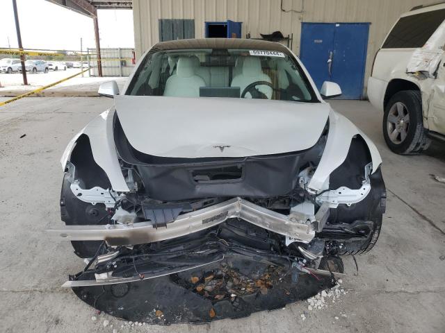 Photo 5 from auction – 2022 TESLA MODEL 3 with VIN 5YJ3E1EAXNF321803