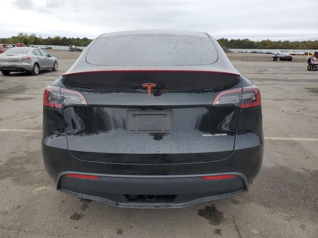 Photo 6 from auction – 2023 TESLA MODEL Y with VIN 7SAYGAEE5PF926448