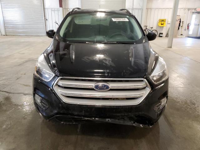 Photo 5 from auction – 2018 FORD ESCAPE SE with VIN 1FMCU9GD7JUC40568