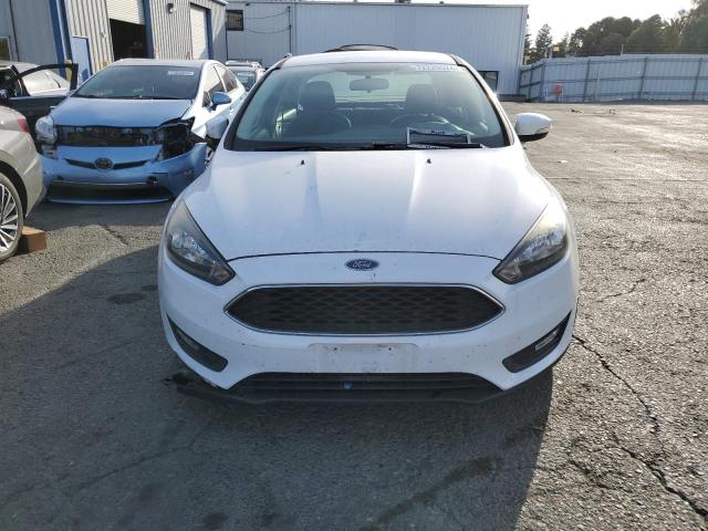Photo 5 from auction – 2016 FORD FOCUS SE with VIN 1FADP3F21GL388149