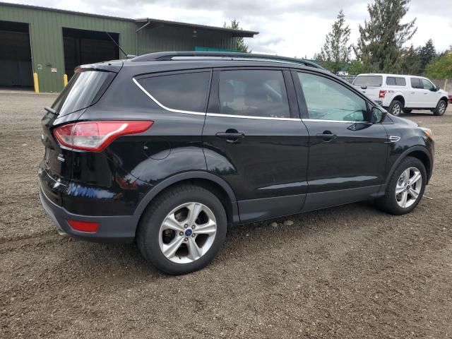 Photo 3 from auction – 2016 FORD ESCAPE SE with VIN 1FMCU9GX2GUA40135