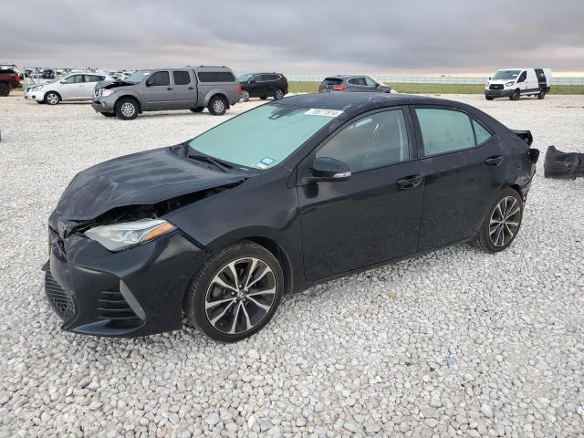 TOYOTA COROLLA L 2018 with VIN 5YFBURHE6JP833620 - Photo from auction