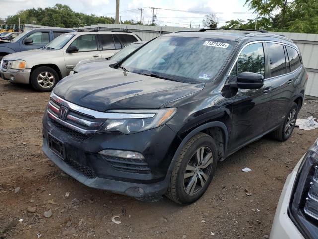 HONDA PILOT EXL 2017 with VIN 5FNYF6H68HB025996 - Photo from auction