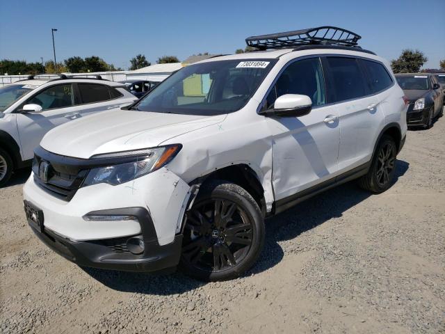 HONDA PILOT SE 2022 with VIN 5FNYF6H28NB076147 - Photo from auction