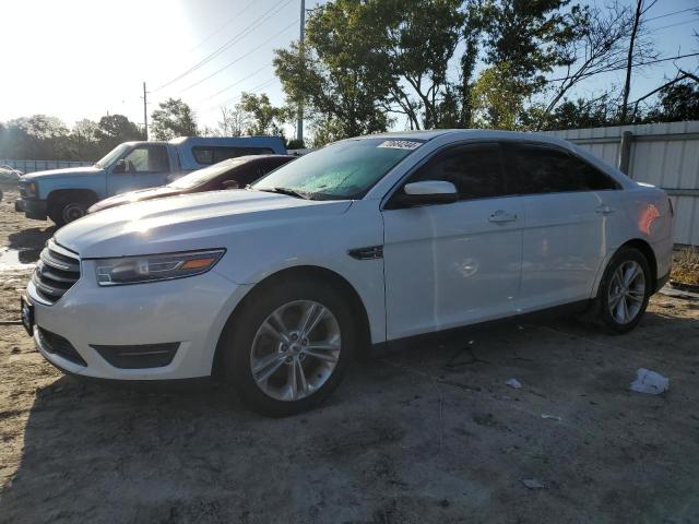 FORD TAURUS SEL 2013 with VIN 1FAHP2E86DG111437 - Photo from auction