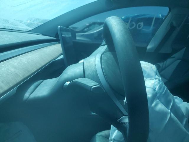 Photo 9 from auction – 2022 TESLA MODEL Y with VIN 7SAYGDEF2NF405453