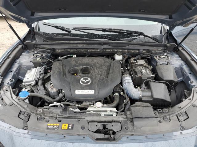 Photo 12 from auction – 2023 MAZDA CX-50 PREM with VIN 7MMVABEY1PN106323