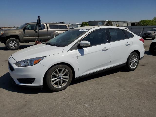 FORD FOCUS SE 2017 with VIN 1FADP3F26HL345685 - Photo from auction