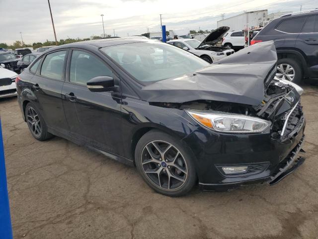 Photo 4 from auction – 2016 FORD FOCUS SE with VIN 1FADP3F23GL309810