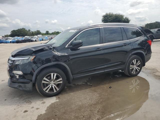 HONDA PILOT EXL 2016 with VIN 5FNYF5H66GB031921 - Photo from auction