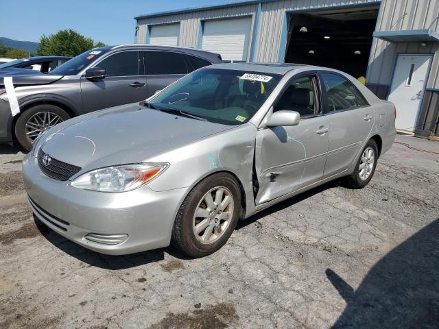 TOYOTA CAMRY LE 2002 with VIN 4T1BF30KX2U024288 - Photo from auction
