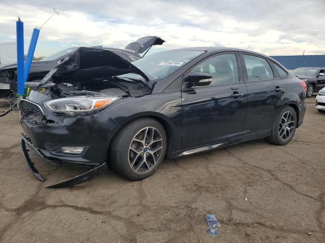 FORD FOCUS SE 2016 with VIN 1FADP3F23GL309810 - Photo from auction
