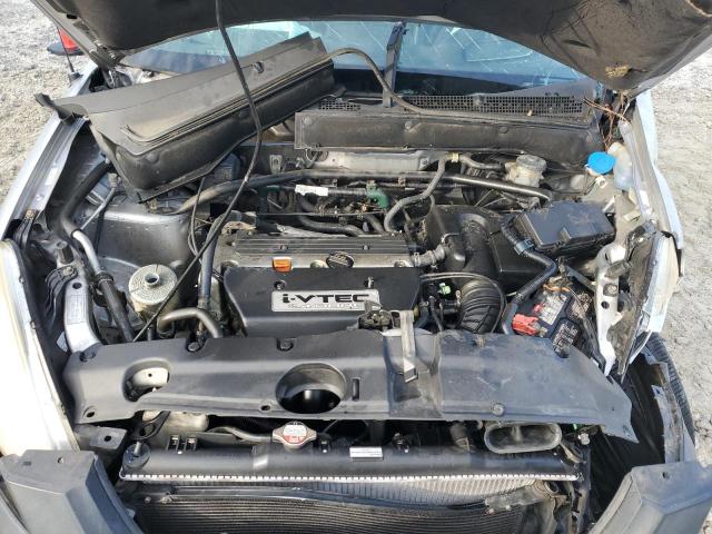 Photo 12 from auction – 2004 HONDA CR-V LX with VIN SHSRD68454U203052