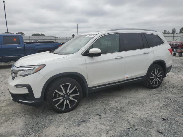 Photo 1 from auction – 2021 HONDA PILOT TOUR with VIN 5FNYF5H6XMB001039