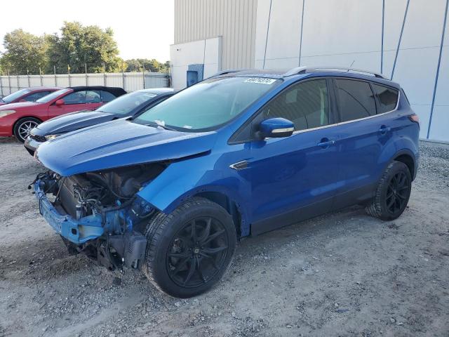 FORD ESCAPE TIT 2017 with VIN 1FMCU9JD3HUD21361 - Photo from auction