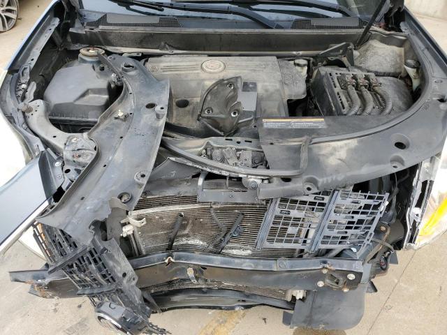 Фото 12 с аукциона – 2015 CADILLAC SRX с VIN 3GYFNAE38FS529065
