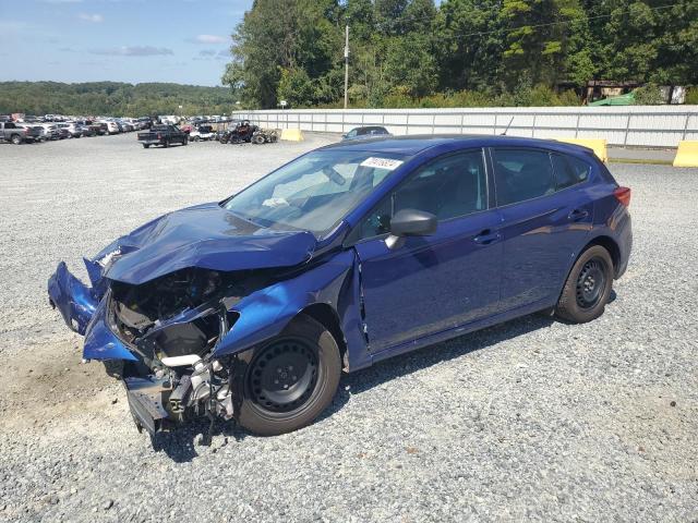 SUBARU IMPREZA 2018 with VIN 4S3GTAA64J3729309 - Photo from auction