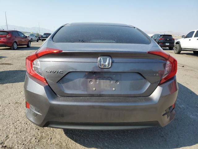 Photo 6 from auction – 2018 HONDA CIVIC LX with VIN 19XFC2E54JE027342