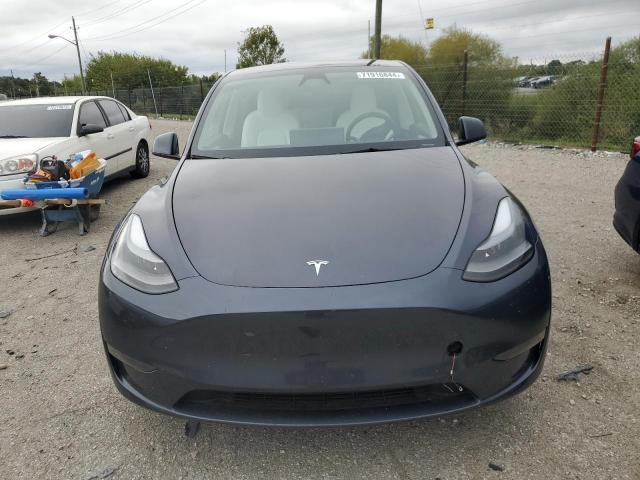 Photo 5 from auction – 2023 TESLA MODEL Y with VIN 7SAYGAEE2PF845567