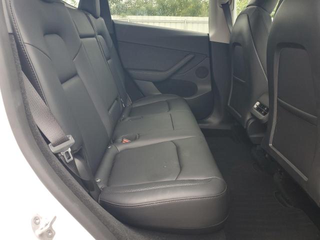 Photo 11 from auction – 2023 TESLA MODEL Y with VIN 7SAYGDEE3PF831288