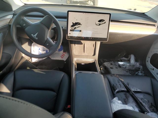 Photo 8 from auction – 2021 TESLA MODEL 3 with VIN 5YJ3E1EA9MF098314