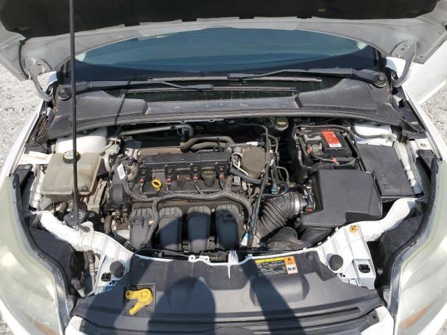 Photo 11 from auction – 2013 FORD FOCUS SE with VIN 1FADP3F22DL235338
